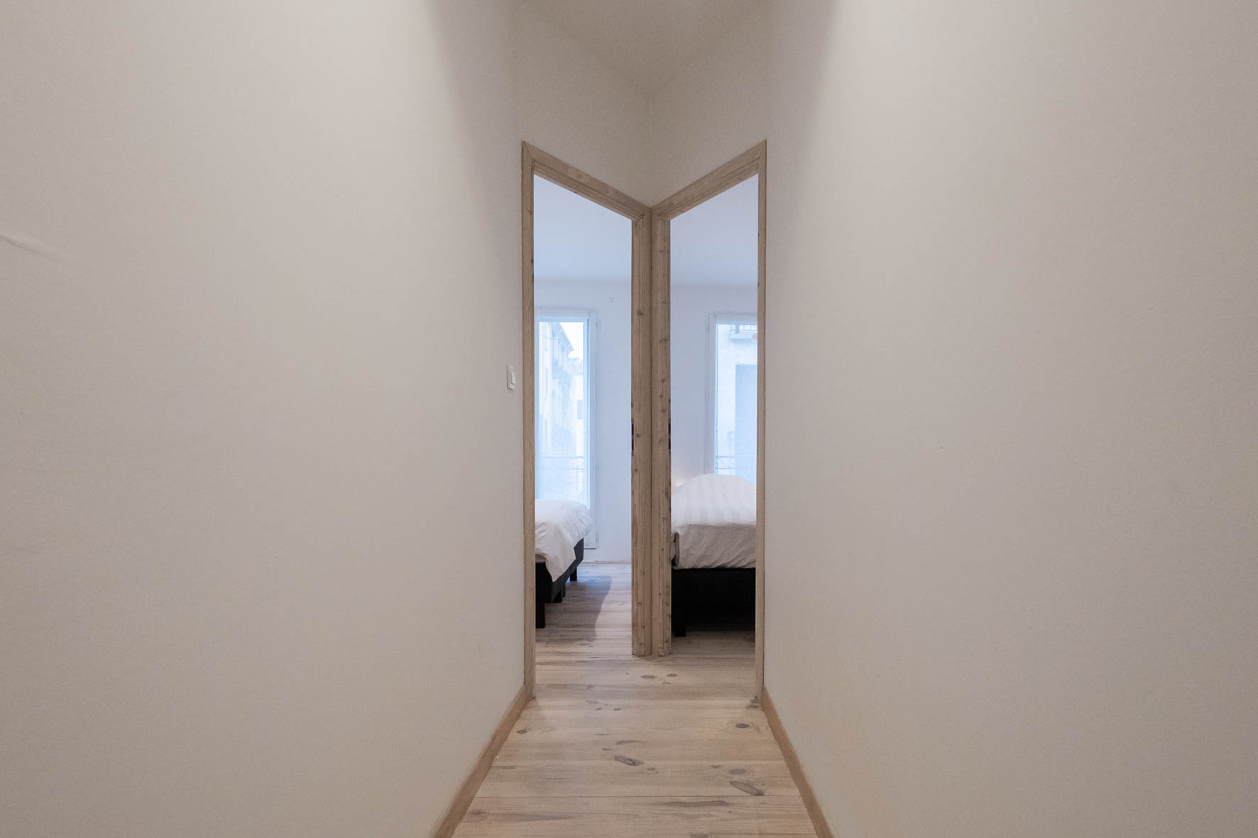 Gang naar de slaapkamers van Duplex 77